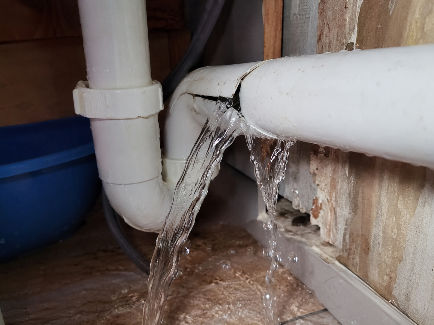 Burst pipe leak requiring emergency cleanup